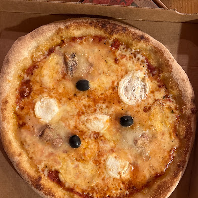Plat servi chez Momento Pizzas, photographié par Léa LANGLOIS